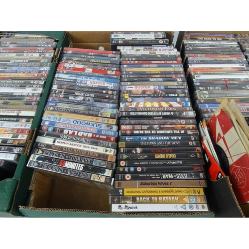 231 - Four boxes of assorted DVD's and a small selection of CD's