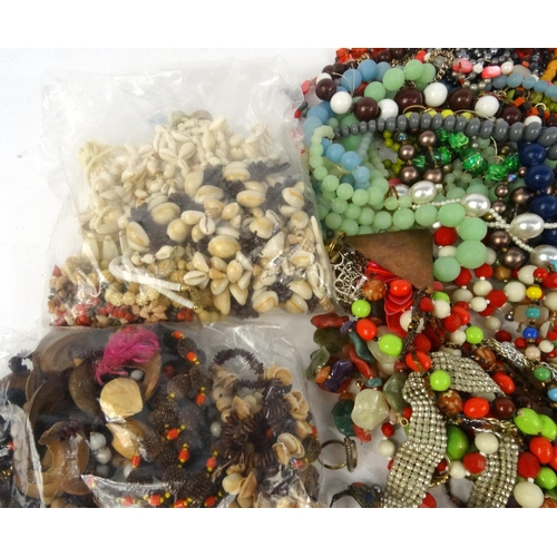 385 - Large selection of costume jewellery necklaces, including shells, pips etc.