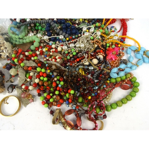 385 - Large selection of costume jewellery necklaces, including shells, pips etc.