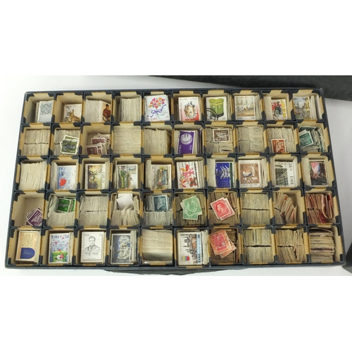 589 - Two boxes of assorted World stamps, approximately 16,000 in total