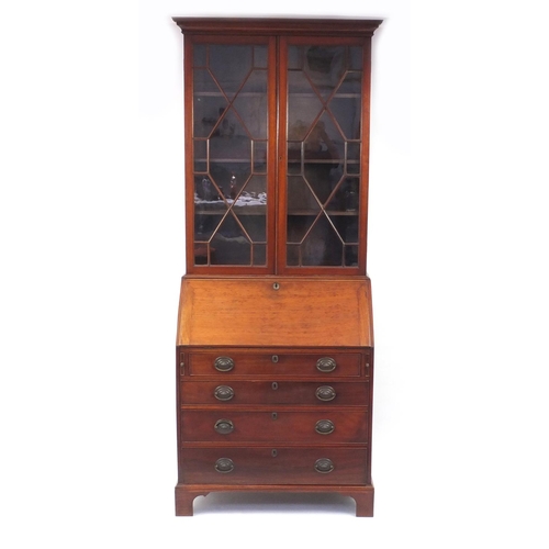 2011 - Late Victorian mahogany bureau bookcase fitted with a pair of astragal glazed doors above a fall rev... 