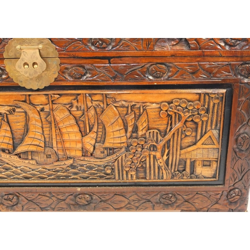 2049 - Oriental Chinese carved camphorwood trunk carved with panels of shipping scenes, 61cm high x 101cm w... 
