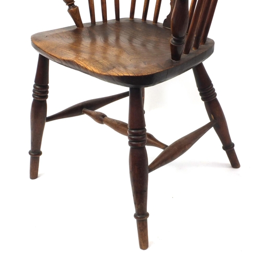 2050 - Elm stick back Windsor chair, 91cm high