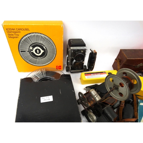 255 - Large selection of photographic equipment including Kodak carousels, some cameras, lenses and filter... 