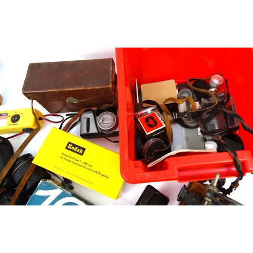 255 - Large selection of photographic equipment including Kodak carousels, some cameras, lenses and filter... 