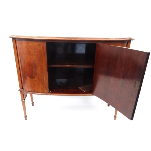 123 - Edwardian inlaid mahogany side board raised on tapering legs, 102cm high x 120cm wide x 44cm deep