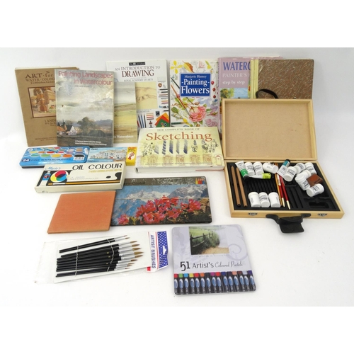 294 - Box of artists paints and books