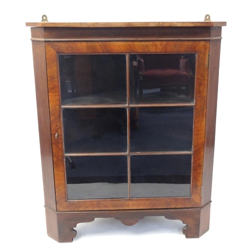 43 - Walnut corner cabinet with a glazed door, 94cm high x 77cm wide x 53cm deep