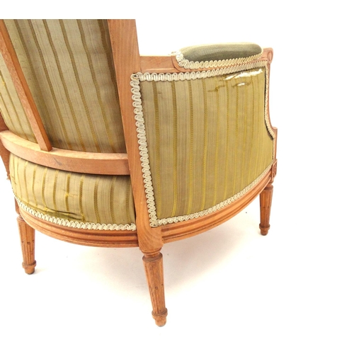 60 - Light wood open armchair with green striped upholstery