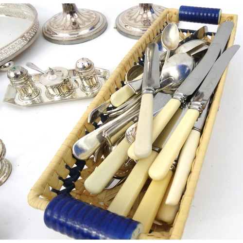 218 - Small selection of silver plated items including a tray, a pair of candlesticks, cruets, cutlery etc... 