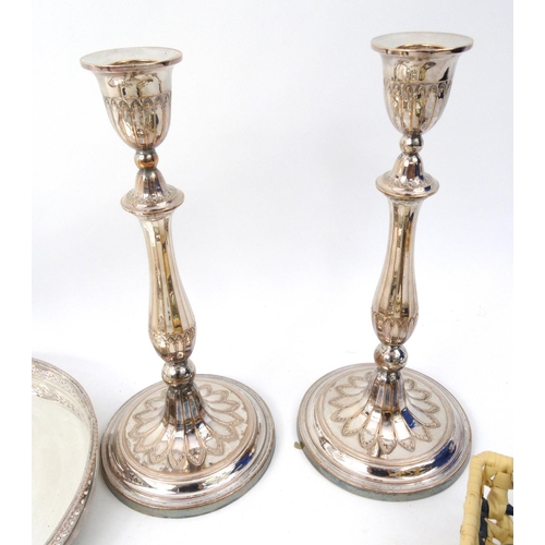 218 - Small selection of silver plated items including a tray, a pair of candlesticks, cruets, cutlery etc... 