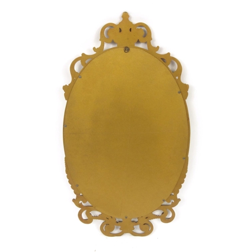 2043 - Ornate gilt framed mirror decorated with urns and swags, 80cm high