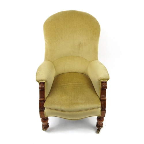 2042 - Victorian walnut framed open arm chair with gold coloured upholstery, 103cm high