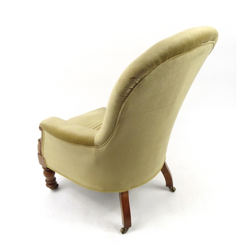 2042 - Victorian walnut framed open arm chair with gold coloured upholstery, 103cm high