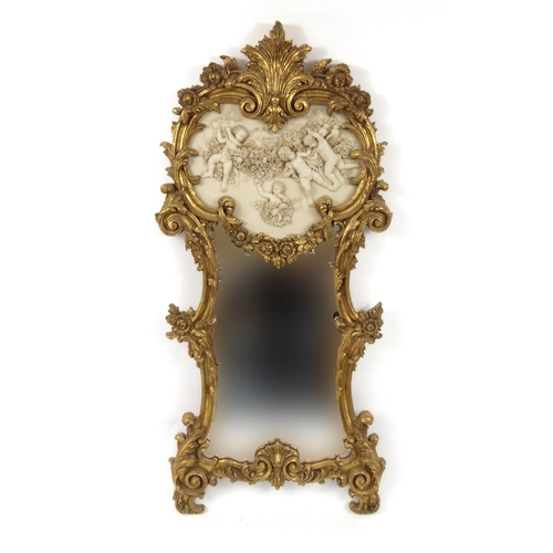 2010 - Rococo style gilt framed mirror with parian style panel decorated in relief with putti, 152cm high