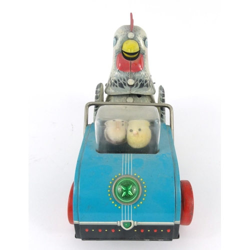 562 - Vintage tin plate clockwork chicken toy, 26cm long