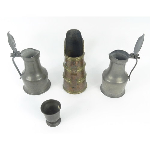 545 - Middle eastern copper and brass vessel, two pewter tankards and a pewter cup