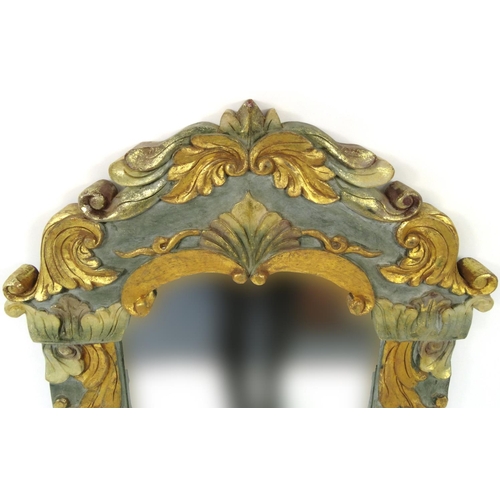 2023 - Ornate gilt framed bevel edged mirror with floral and shell carved decoration, 102cm high