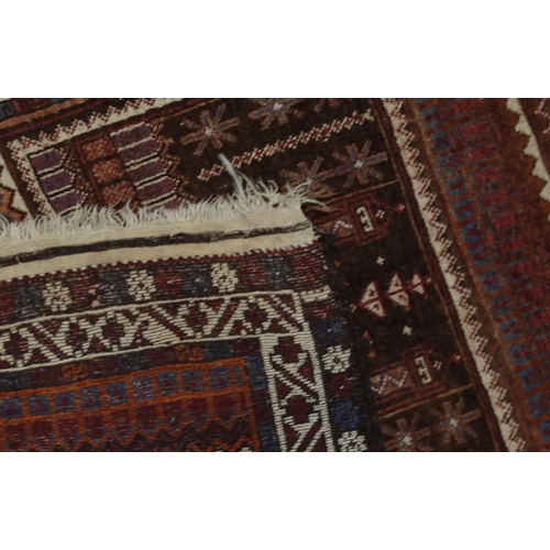 74 - Rectangular Middle Eastern prayer mat with geometric and floral border, the central field decorated ... 