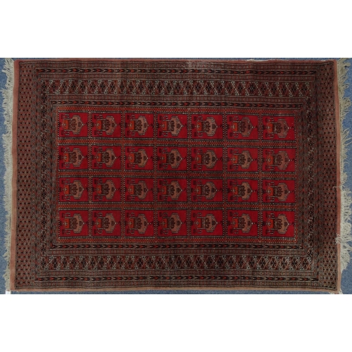 161 - Rectangular Middle Eastern rug with geometric border, the central field decorated with a continuous ... 