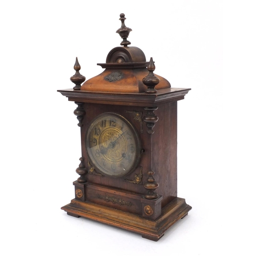 205 - German walnut cased mantel clock, the gilt metal dial decorated with swags, 48cm high