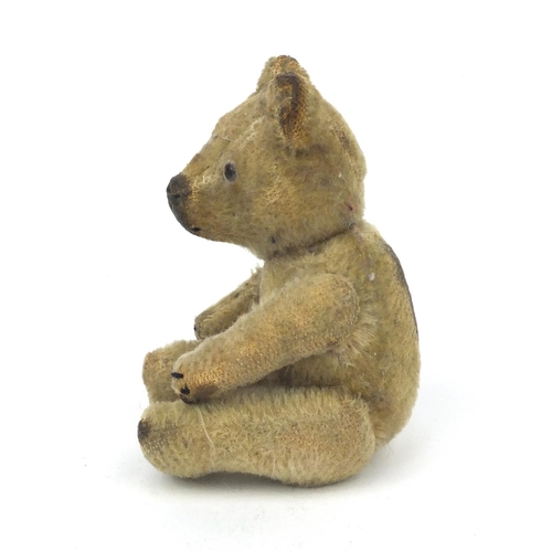 392 - Small old straw filled teddy bear with jointed limbs, 13cm high