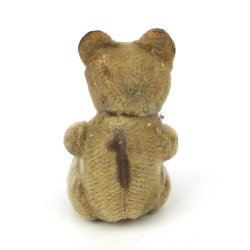 392 - Small old straw filled teddy bear with jointed limbs, 13cm high