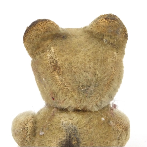 392 - Small old straw filled teddy bear with jointed limbs, 13cm high