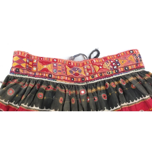 514 - Indian Banjari skirt and bodice with mirrored panels and embroidered with geometric designs, with ca... 