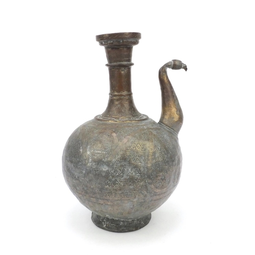 558 - Middle Eastern silvered metal brass water pot with chased abstract design, 36cm high