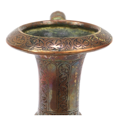 564 - 19th Century Middle Eastern copper floral chased water pot, 33cm high