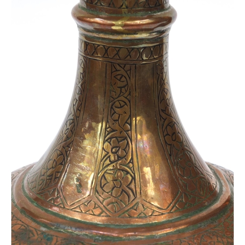 564 - 19th Century Middle Eastern copper floral chased water pot, 33cm high