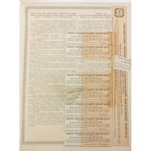 595 - Six Russian share certificates, some with attached bonds and stamps, the largest 41cm x 28cm