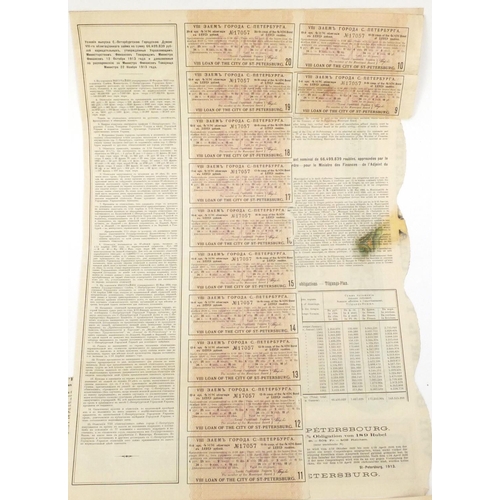 595 - Six Russian share certificates, some with attached bonds and stamps, the largest 41cm x 28cm