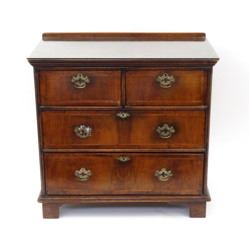 2005 - Antique walnut feather banded four drawer chest, 81cm high x 84cm wide x 48cm deep