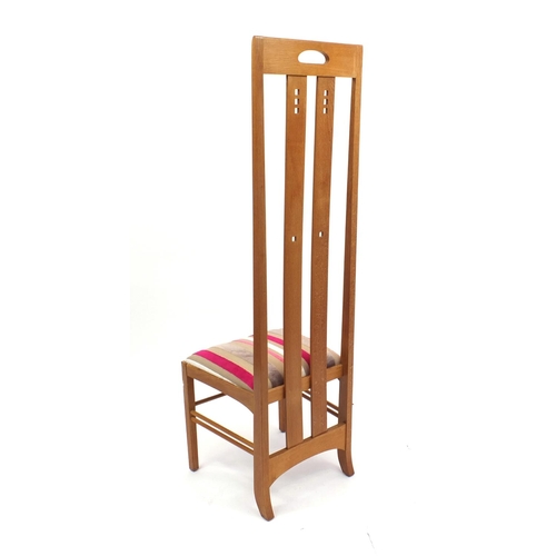 2035 - Charles Rennie McIntosh design light oak dining table, together with six dining chairs including two... 
