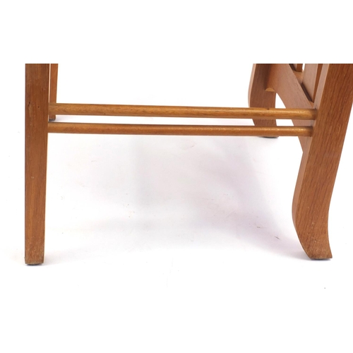 2035 - Charles Rennie McIntosh design light oak dining table, together with six dining chairs including two... 