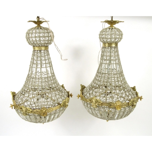 2059 - Pair of Glass chandeliers with ornate gilt brass mounts, each 67cm high