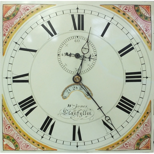 2013 - Victorian oak and mahogany longcase clock with enamelled dial named W M Jones, 230cm high