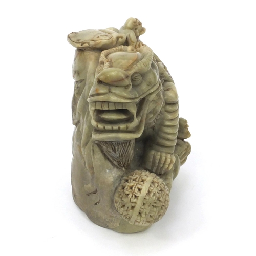 542 - Chinese soapstone carving of a mythical beast and three elders, 16cm high