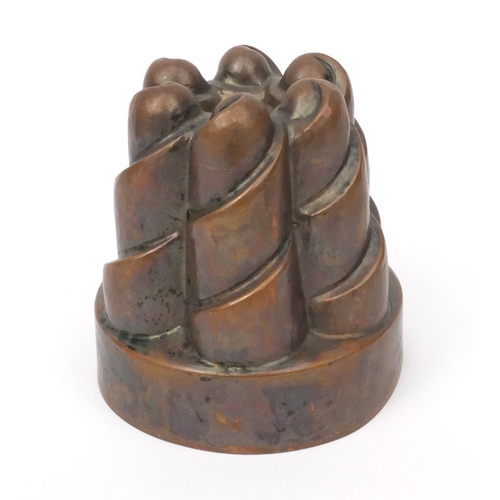 50 - Victorian copper jelly mould, stamped M202, 12.5cm high