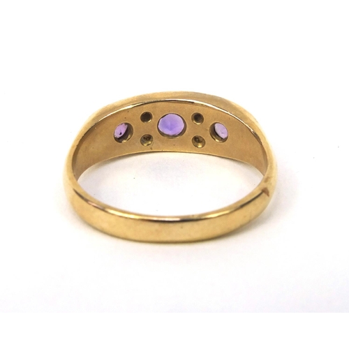 879 - 9ct gold amethyst and seed pearl ring, size M, approximate weight 2.8g