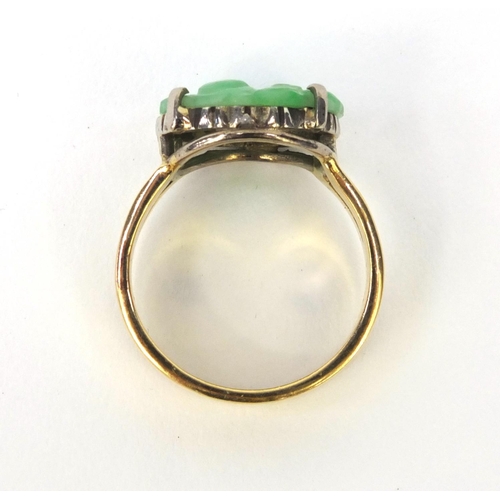 518 - Chinese 18ct gold ring with inset pierced green jade panel, size N, approximate weight 6.6g