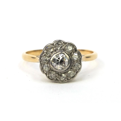 849 - 18ct gold diamond cluster ring, size Q, approximate weight 2.7g