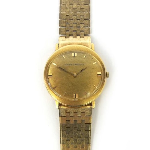 897 - Gentleman's 18ct gold Girard-Perregaux wristwatch with 18ct gold strap, 3.5cm in diameter, approxima... 