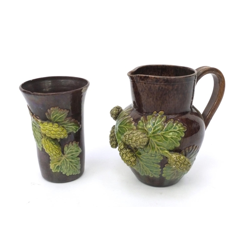 621 - Rye pottery hop patterned jug and vase, factory marks to the base, the jug 11cm high