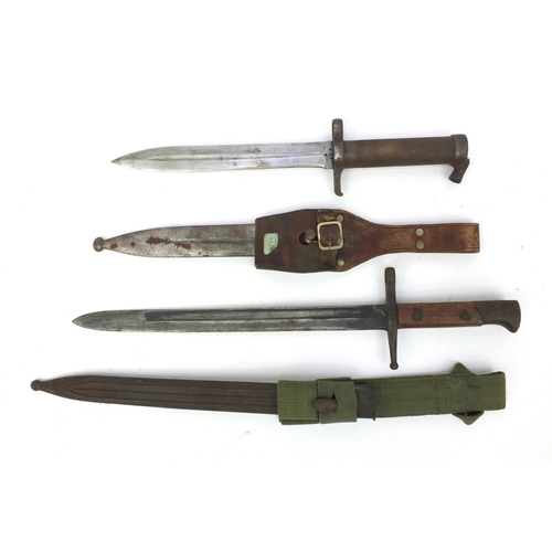 387 - Group of military interest items including a Italian bayonet and scabbard model 1891, Swedish 1896 p... 