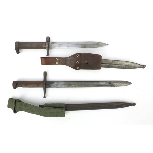 387 - Group of military interest items including a Italian bayonet and scabbard model 1891, Swedish 1896 p... 