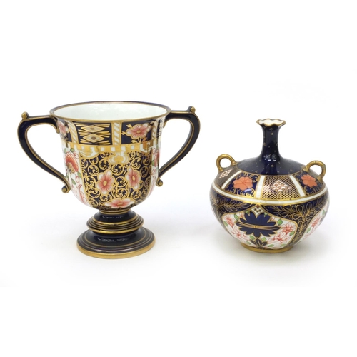 612 - Royal Crown Derby Imari patterned twin handled cup and vase, factory marks to the bases, the tallest... 