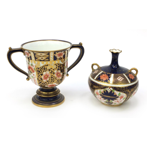 612 - Royal Crown Derby Imari patterned twin handled cup and vase, factory marks to the bases, the tallest... 